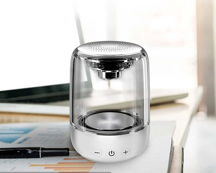 Portable Bluetooth speaker with powerful bass and LED light, ideal for outdoor use and compatible with all Bluetooth devices.