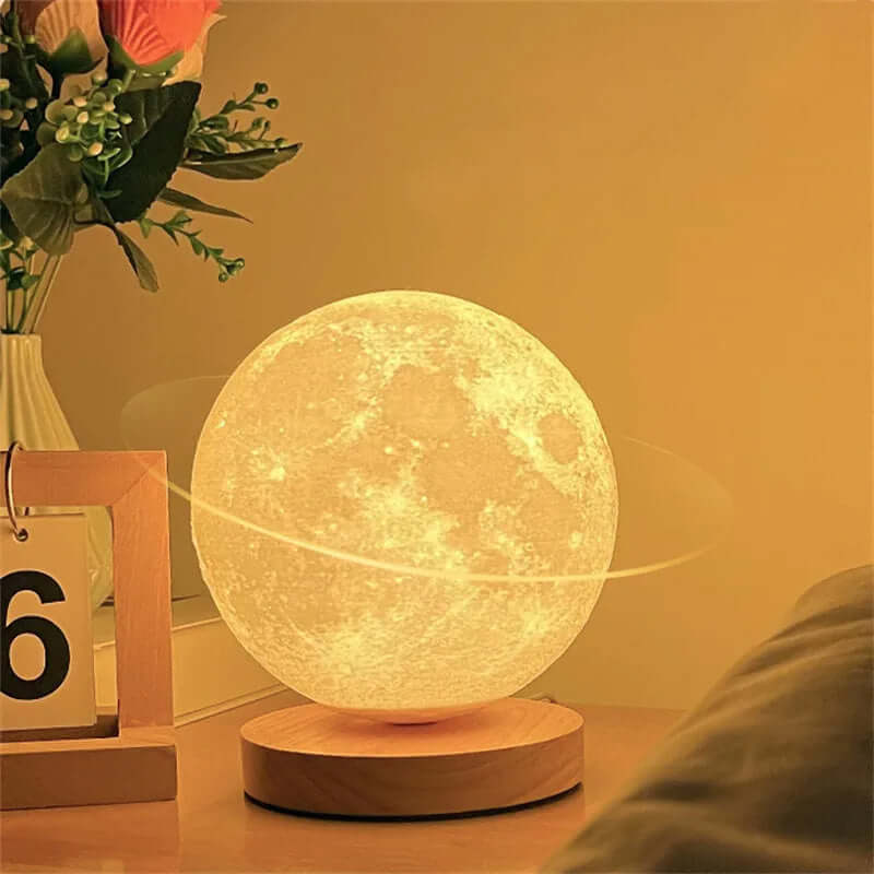 3D magnetic floating levitating moon lamp in warm light with wooden base, ideal for home office decor.