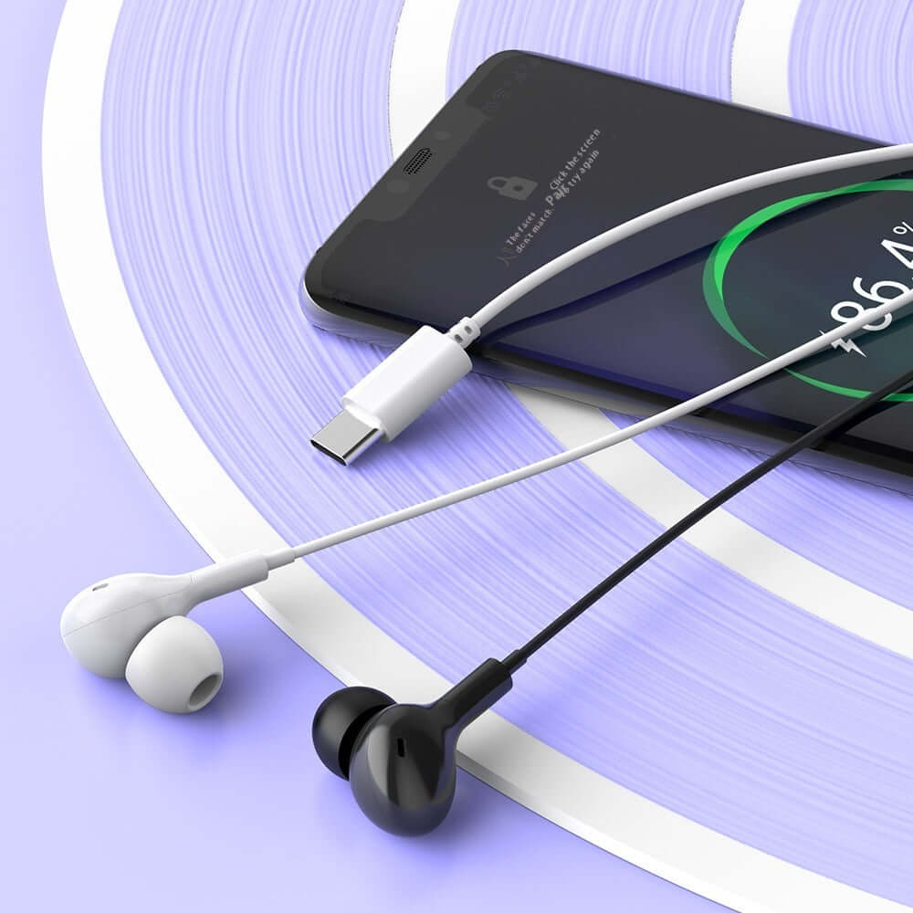 Celebrat in-ear headphones in black and white connected to a smartphone with Type-C, with a 1.2m line length.
