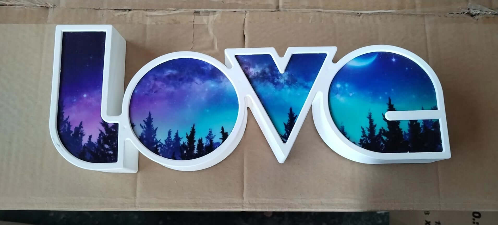 LED ornamental LOVE light with starry sky design, perfect for Christmas decoration and heartfelt confessions.
