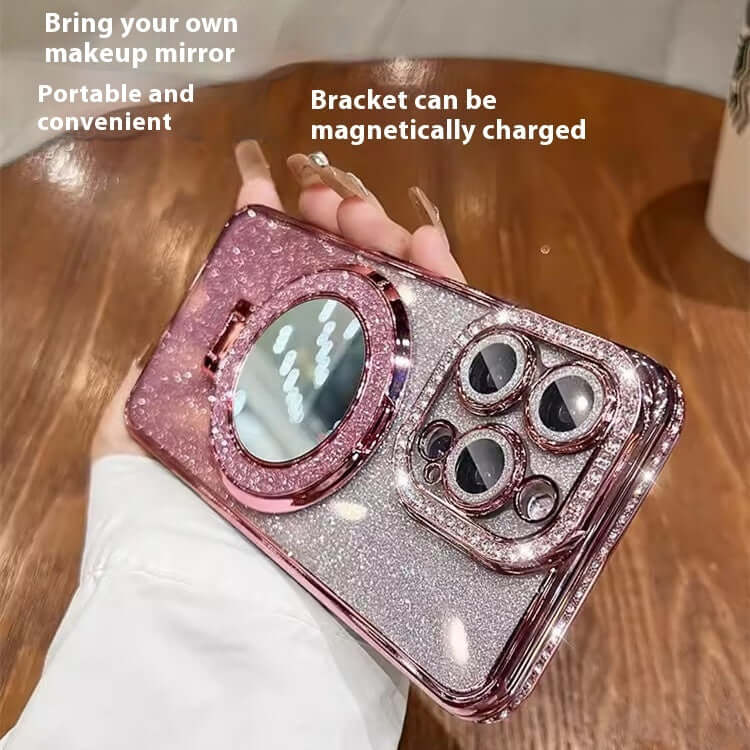 Makeup mirror bracket phone case in glittery pink, showcasing magnetically chargeable feature and convenience for iPhone models.