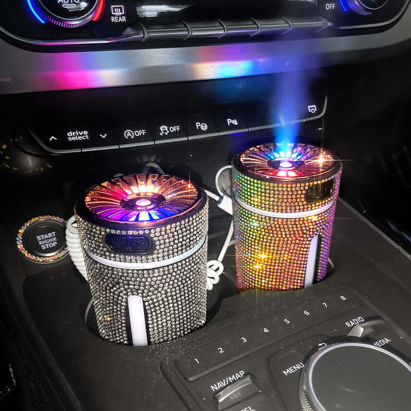 Luxury diamond car humidifiers with LED lights, creating a colorful mist in a car interior.