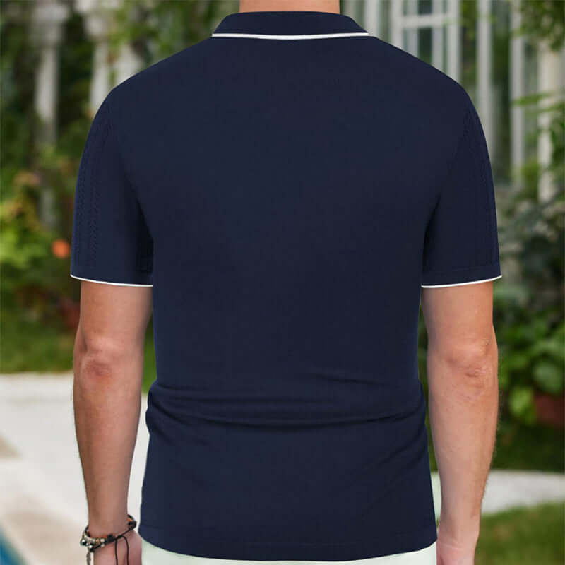 Back view of a navy short-sleeved polo shirt with white trim, perfect for summer casual wear.