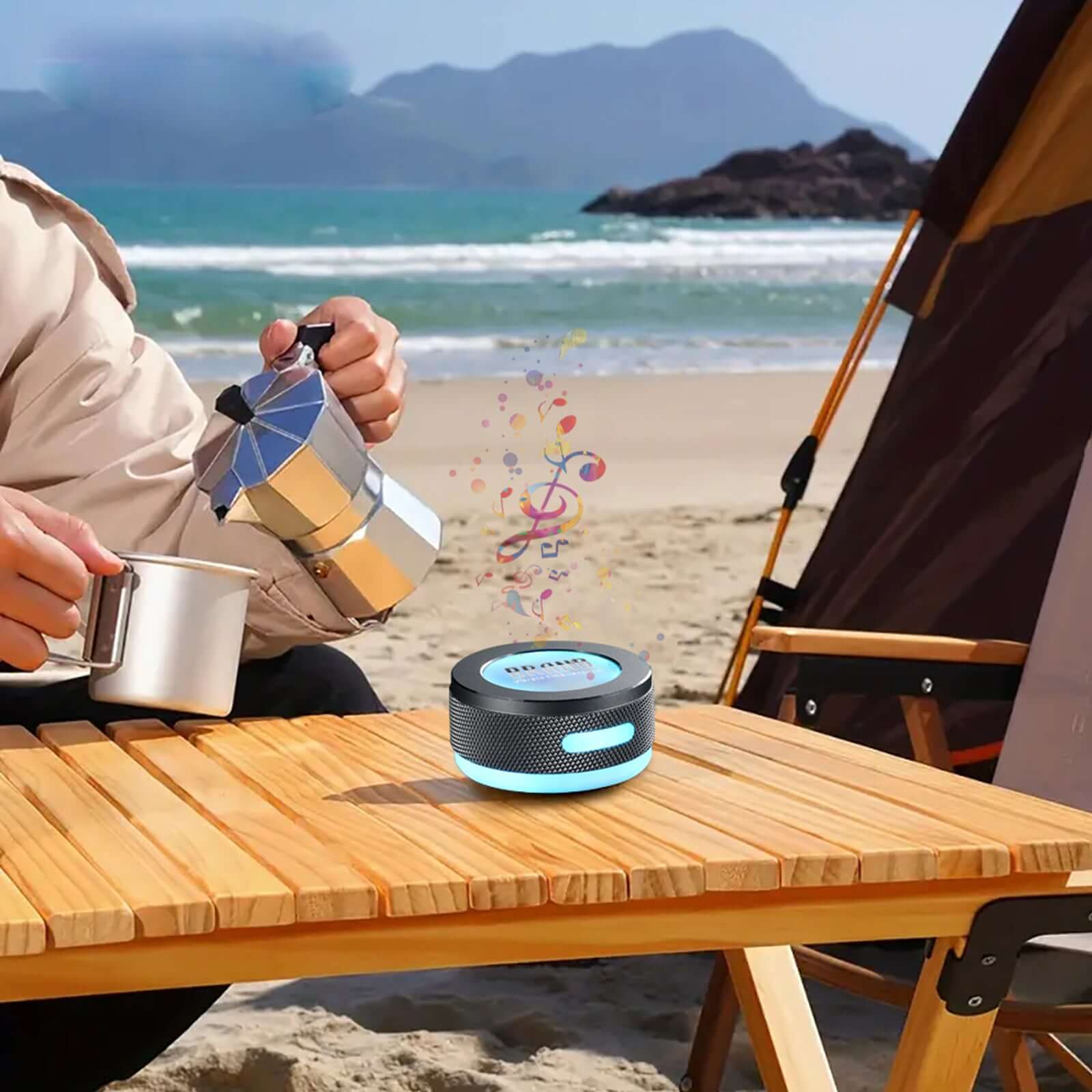 Small Wireless Bone Conduction Speakers Bluetooth Vibration speaker on beach table with coffee.