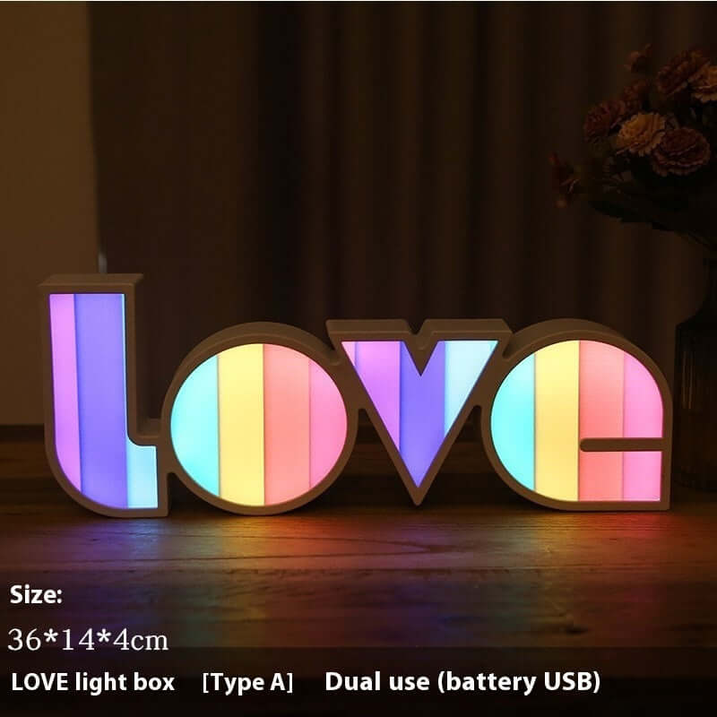 Colorful LED LOVE light box for holiday decorations, battery-operated, geometric design, home decor accent.