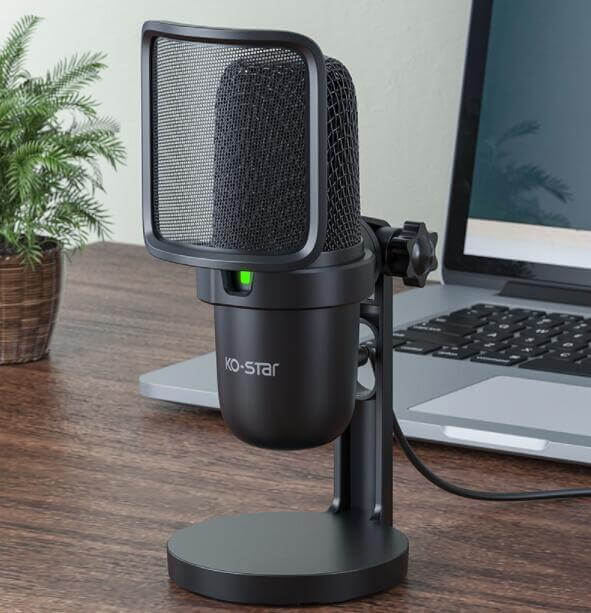 USB wired microphone on a desk, perfect for gaming and live broadcasting, featuring a pop filter and sleek design.
