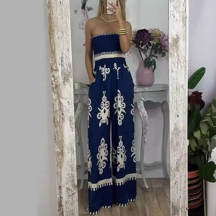 Women's high-waisted navy blue jumpsuit with printed design, perfect for casual wear, featuring a strapless style.