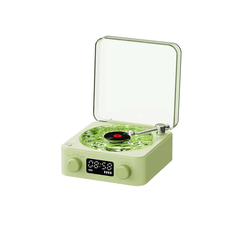 Retro turntable speaker in mint green color with transparent lid and vinyl record, featuring digital display and controls.