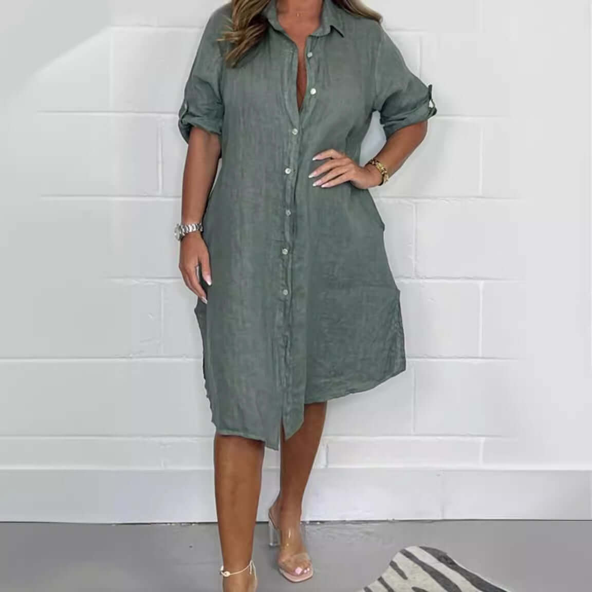 Loose casual half sleeve solid color cotton linen shirt dress in light green, featuring a button-up design and A-line skirt.