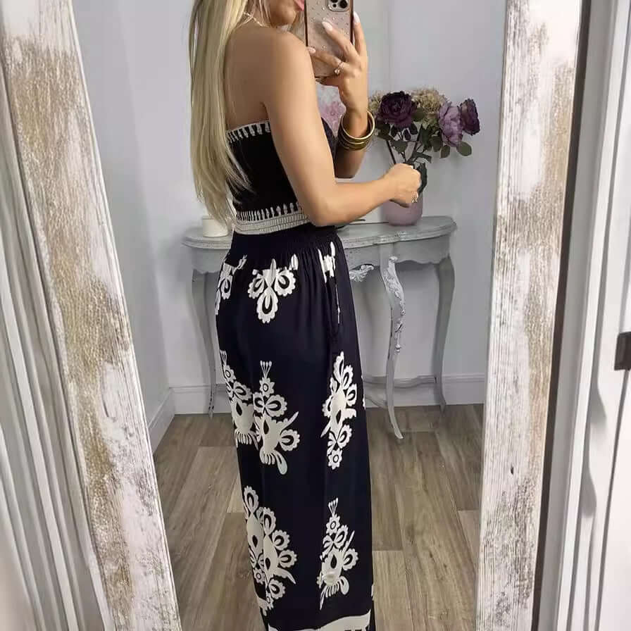 High waisted jumpsuit for women in black and white print, showcasing a stylish back view in a mirror.