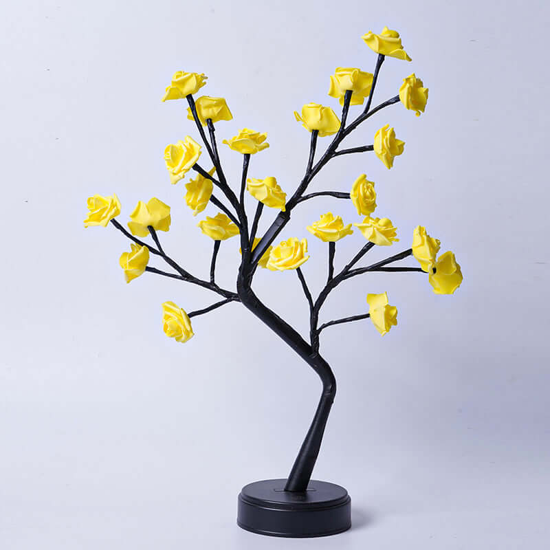 Yellow rose tree lamp design with a black base, ideal for home decoration and creating a romantic atmosphere.