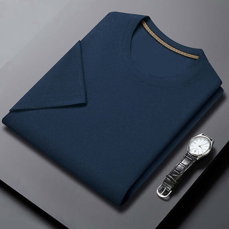 Men's round neck breathable top in navy blue with a stylish watch, perfect for casual wear.