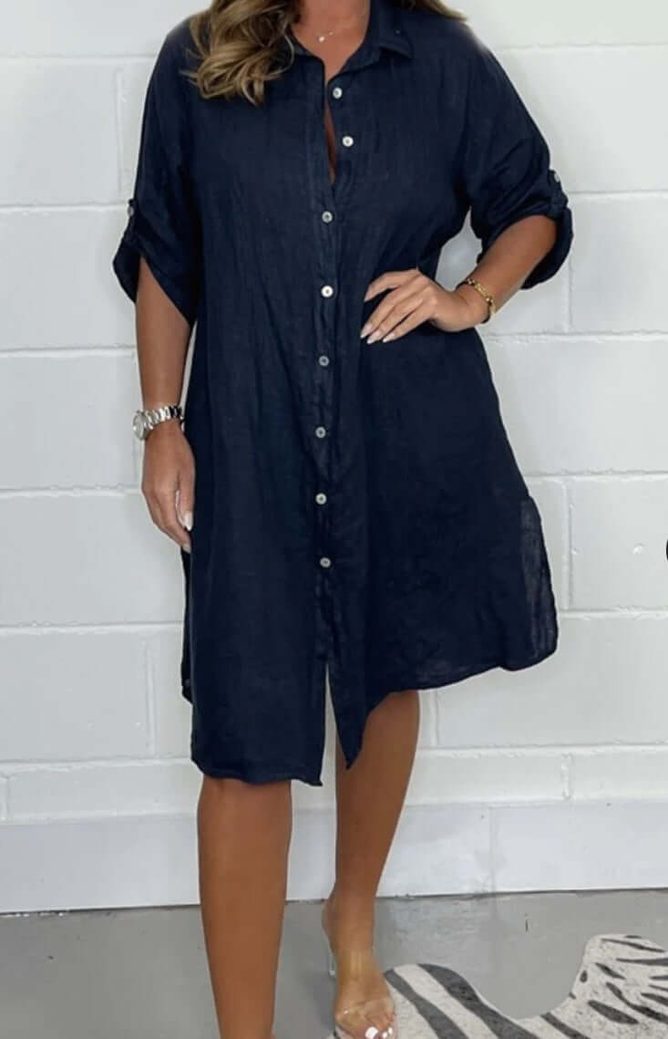 Loose casual navy blue half sleeve cotton linen dress with button front and A-line design.