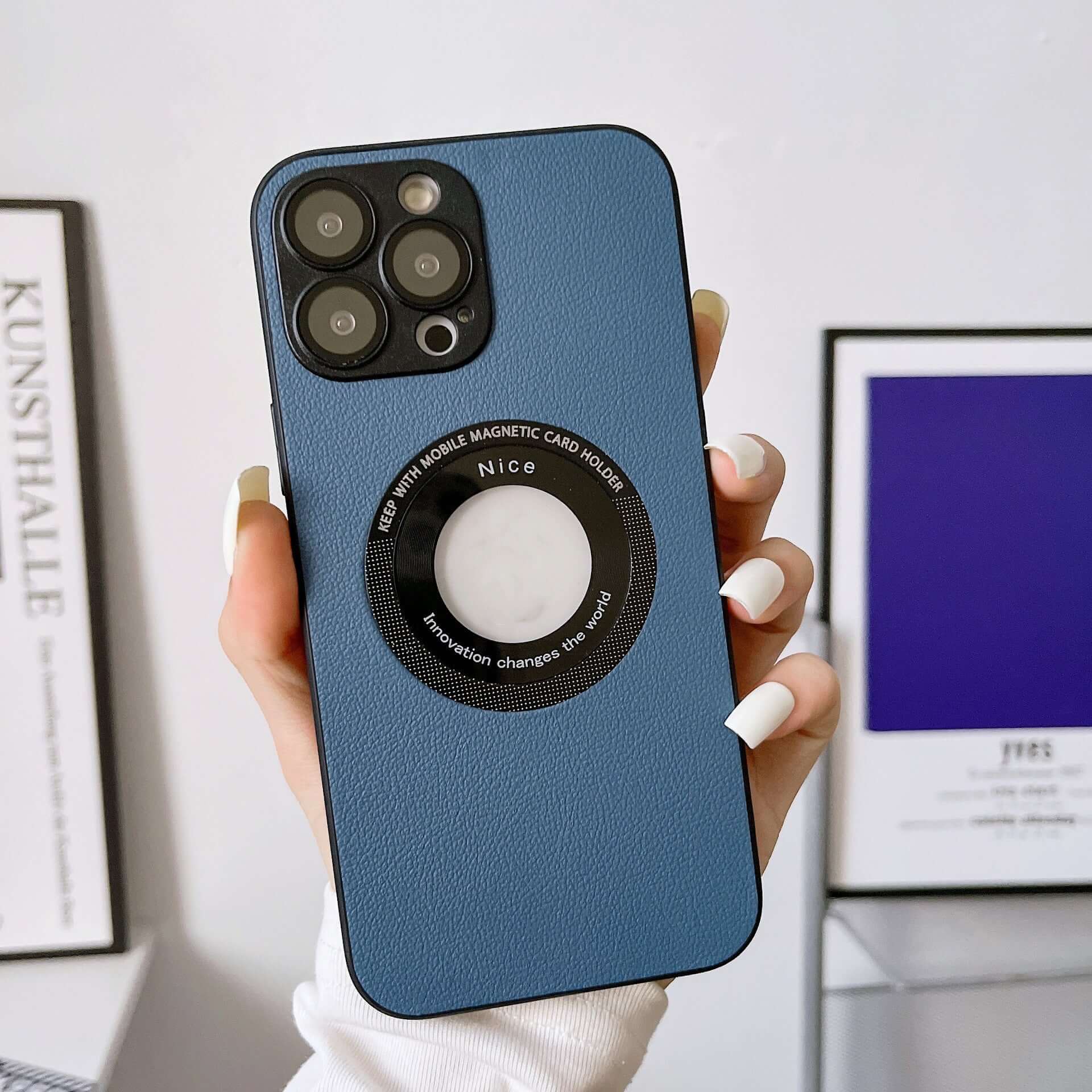 iPhone 15 Pro case in blue litchi grain leather with magnetic card holder for protection and style.