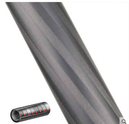 Close-up of a carbon fiber monopod tube with measurement markings for SLR camera support.