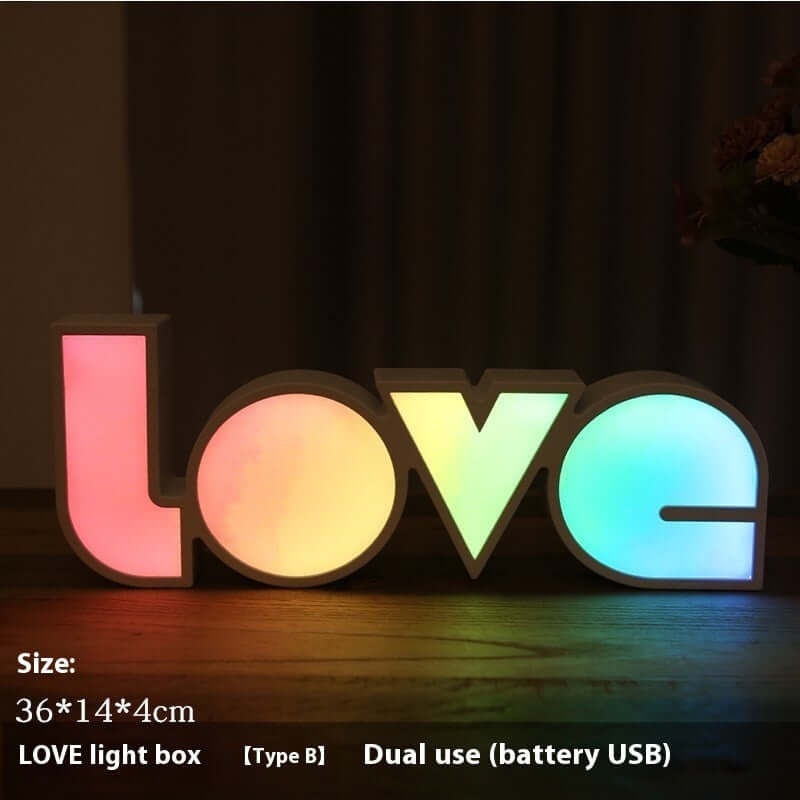 Colorful LED LOVE light box for decorative holiday use, perfect for home and hotel settings.