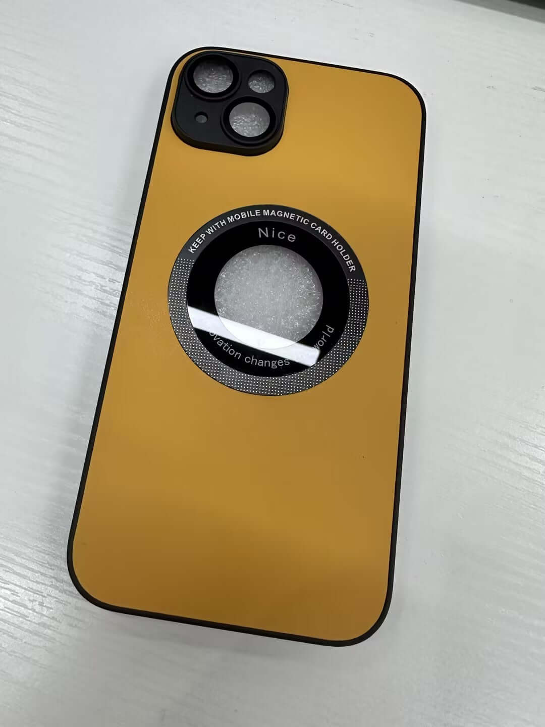 Yellow magnetic phone case featuring dual-camera cutout and textured design, compatible with iPhone models.