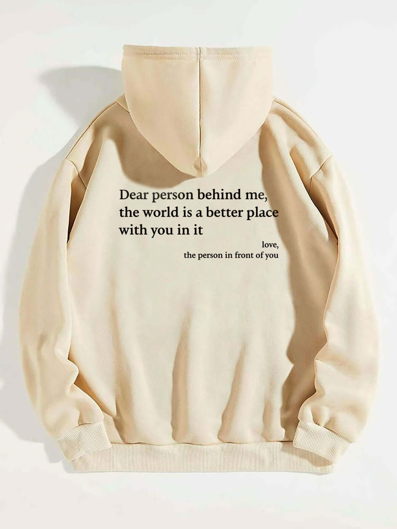 Beige unisex hoodie with printed message: 'Dear person behind me, the world is a better place with you in it'.