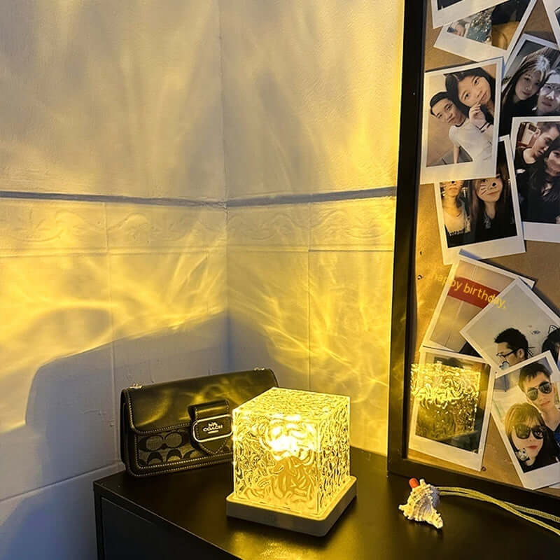 LED water ripple lamp casting warm light patterns on wall, enhancing home decor with cozy ambiance.