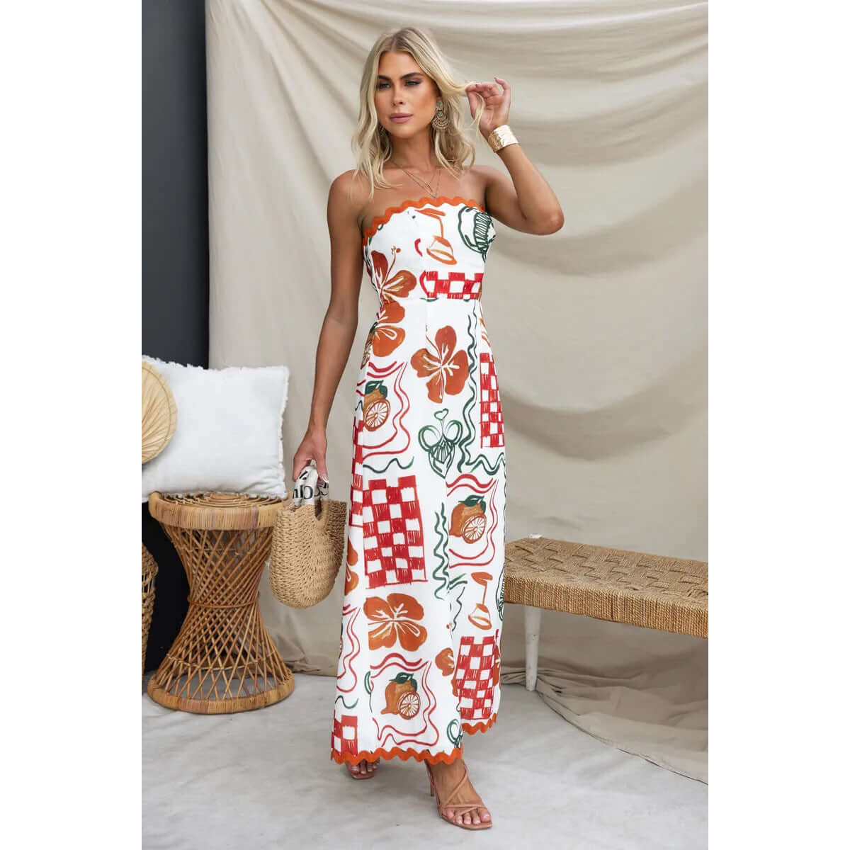 Women's chest-wrapped pleated casual dress featuring a floral and plant print, perfect for summer and relaxed styles.