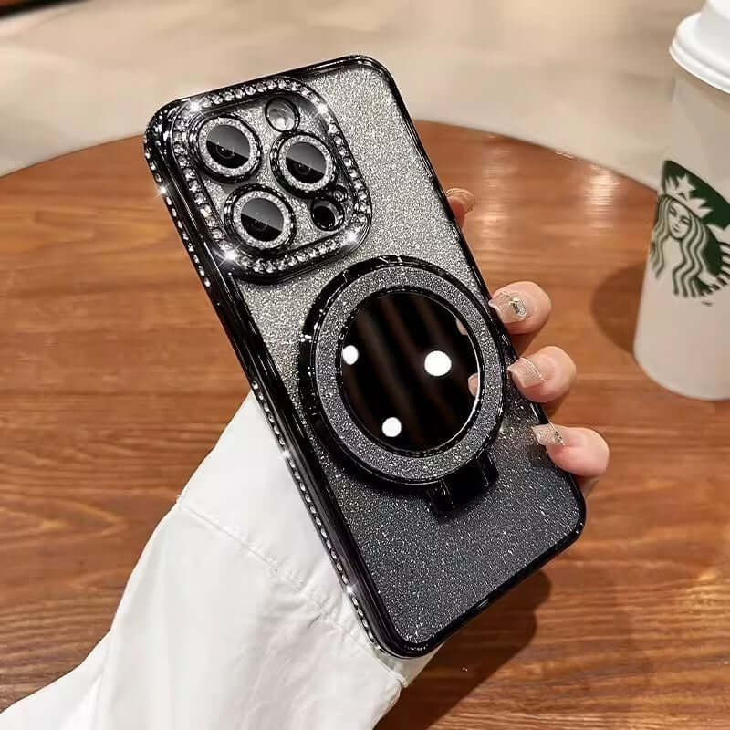 Makeup mirror bracket phone case in glitter black, compatible with various iPhone models, held in a hand.