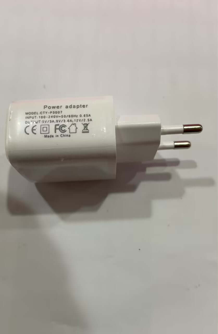 White power adapter with dual pins, model CT-PS007, suitable for various electronic devices.