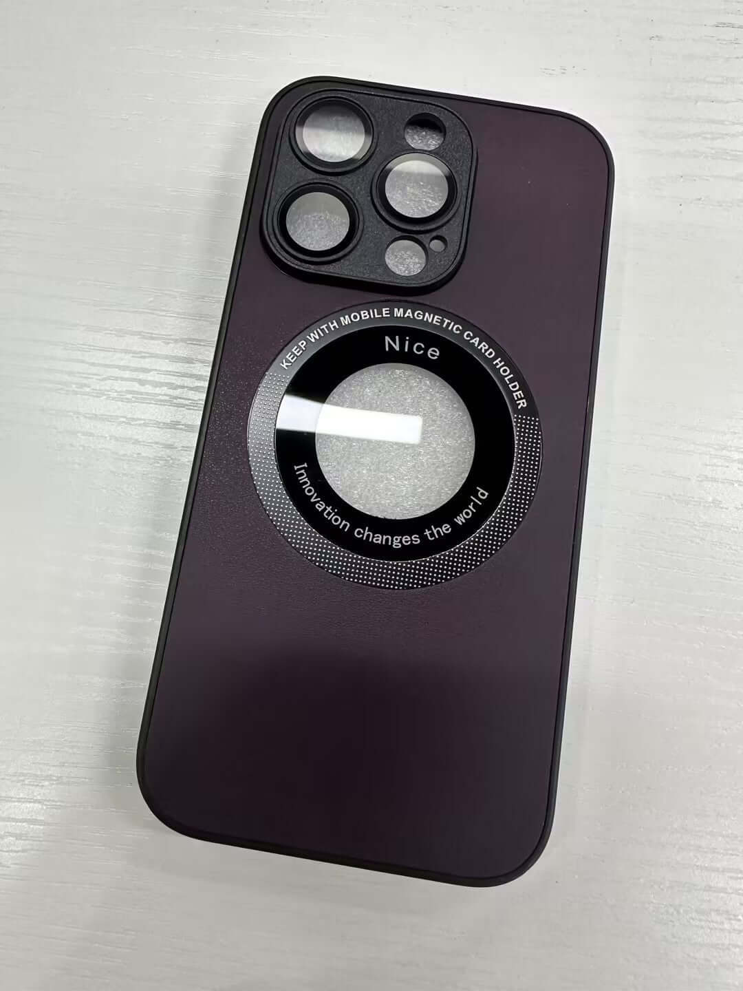 Purple back cover phone case with magnetic feature and camera cutouts for smartphone protection.