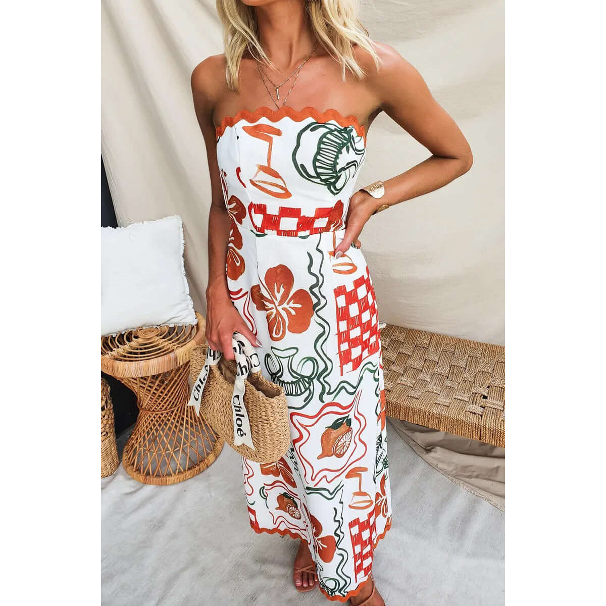 Woman in a strapless chest-wrapped dress featuring a plant and flower pattern, perfect for casual occasions.