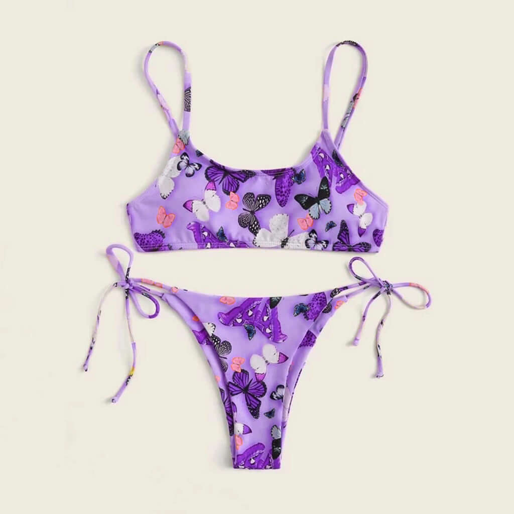 Purple bikini with butterfly print, stylish push-up design for beach wear, perfect summer swim suit for women.