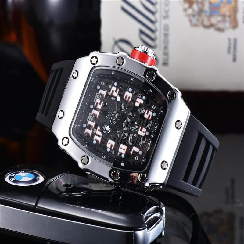 Stylish square quartz watch with black rubber strap and stainless steel case, featuring a unique dial design.