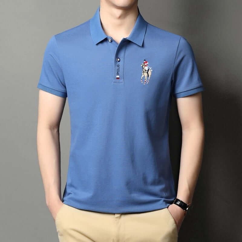 Summer men's lapel embroidery top in solid blue cotton, featuring short sleeves and contemporary design for casual wear.