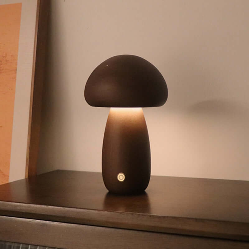 Wooden mushroom LED night light with touch switch on bedside table, ideal for children's bedroom decor.