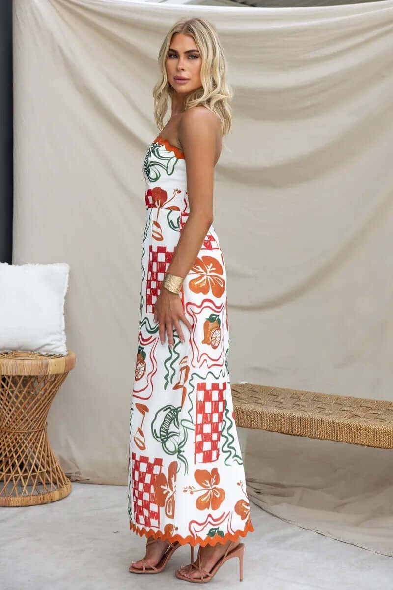 Women's chest-wrapped pleated long dress with plant and flower print, mid waist, Japanese and Korean casual style.