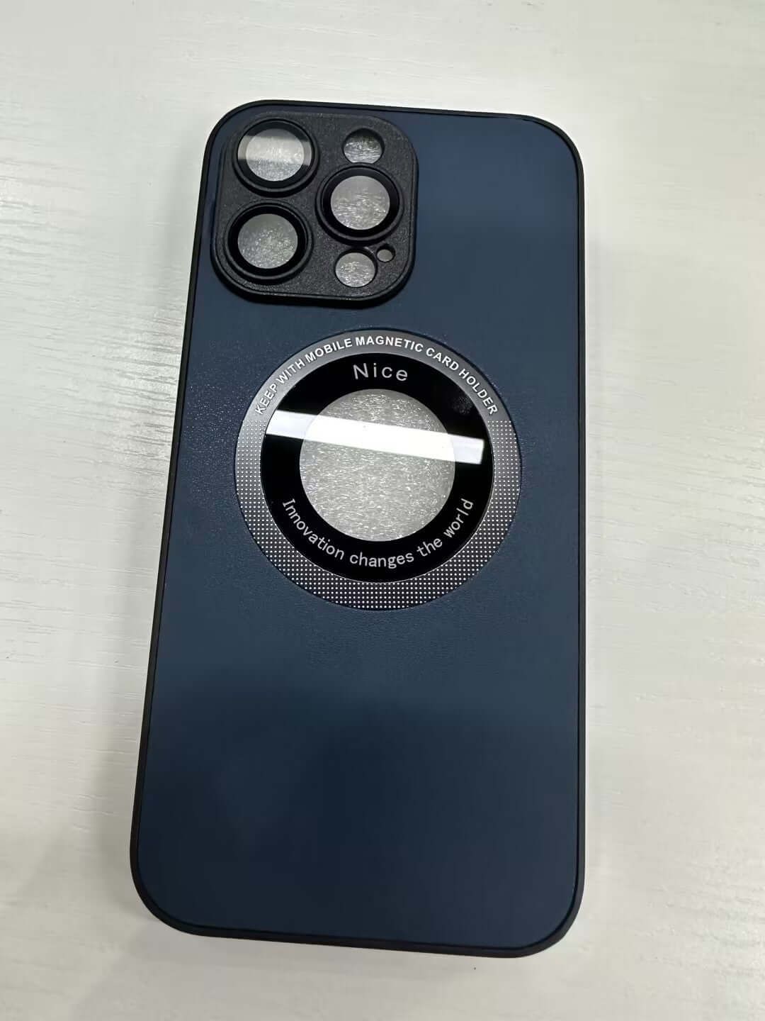 Navy blue phone case with magnetic feature, showcasing sleek design and style for iPhone models.