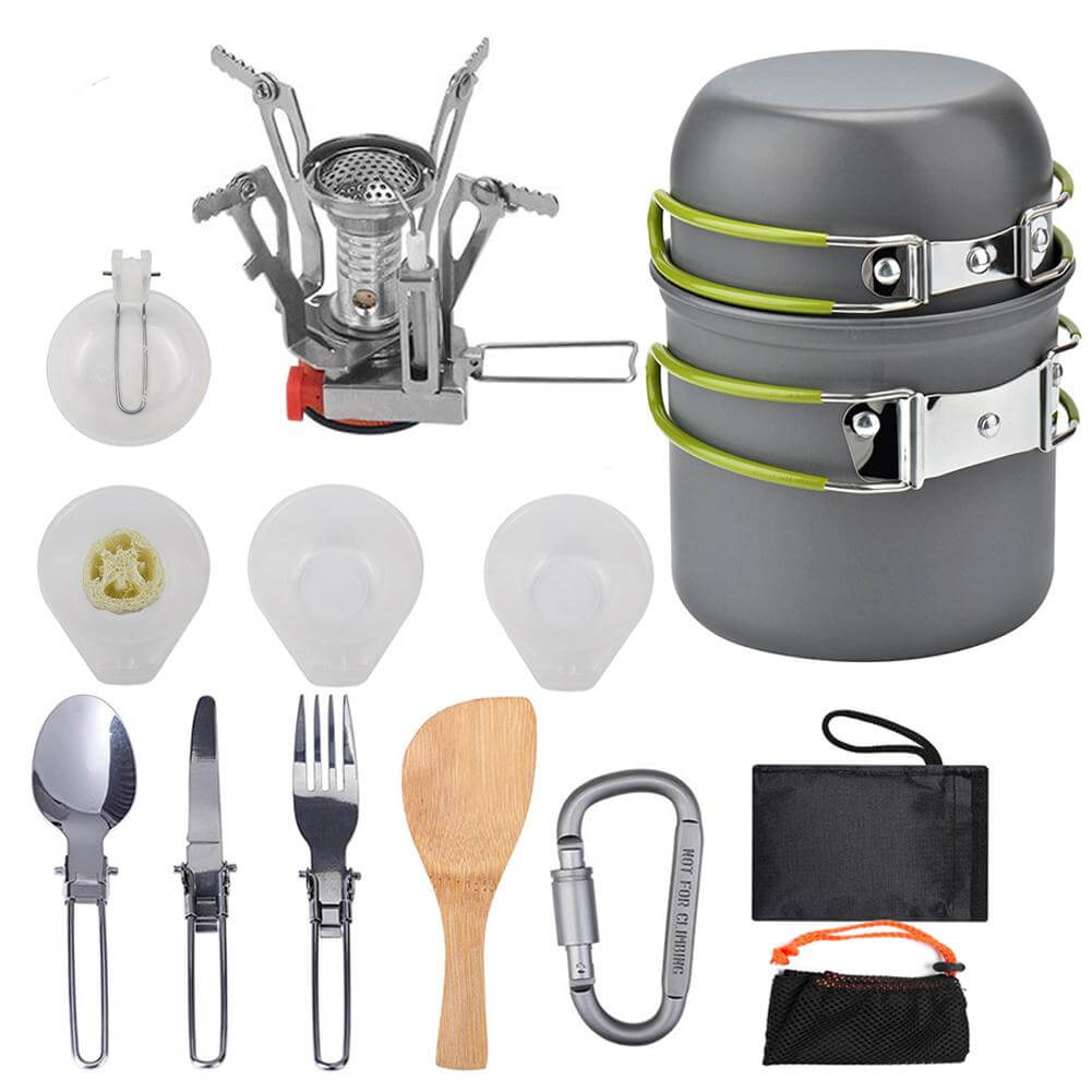 Portable camping stove set including pot, frying pan, teapot, utensils, and burner for outdoor cooking.