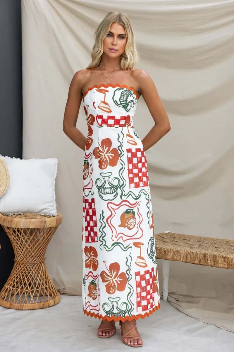 Women's chest-wrapped pleated casual dress with floral and plant patterns, perfect for summer outings.