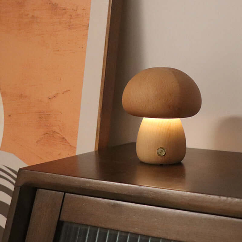 Wooden mushroom LED night light on bedside table, providing cozy ambiance for children's room decor.