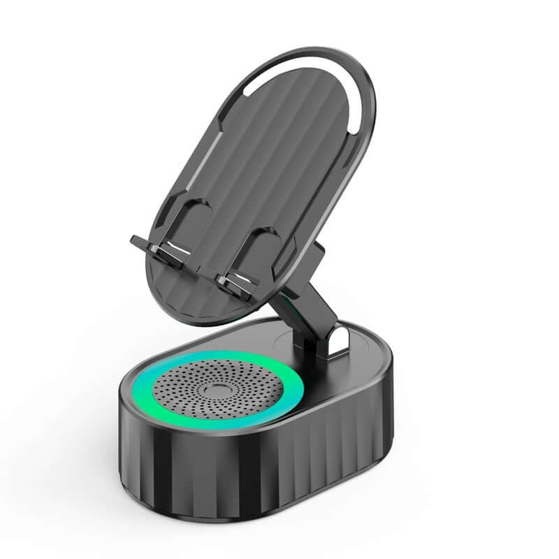 Fashion Ambience Light Bluetooth Speaker in sleek black design with adjustable stand and vibrant green base lighting.
