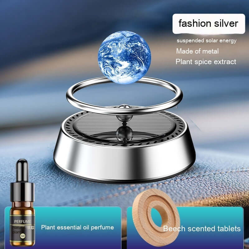 Solar energy rotating car aromatherapy ornament in silver, featuring essential oil and beech scented tablets.