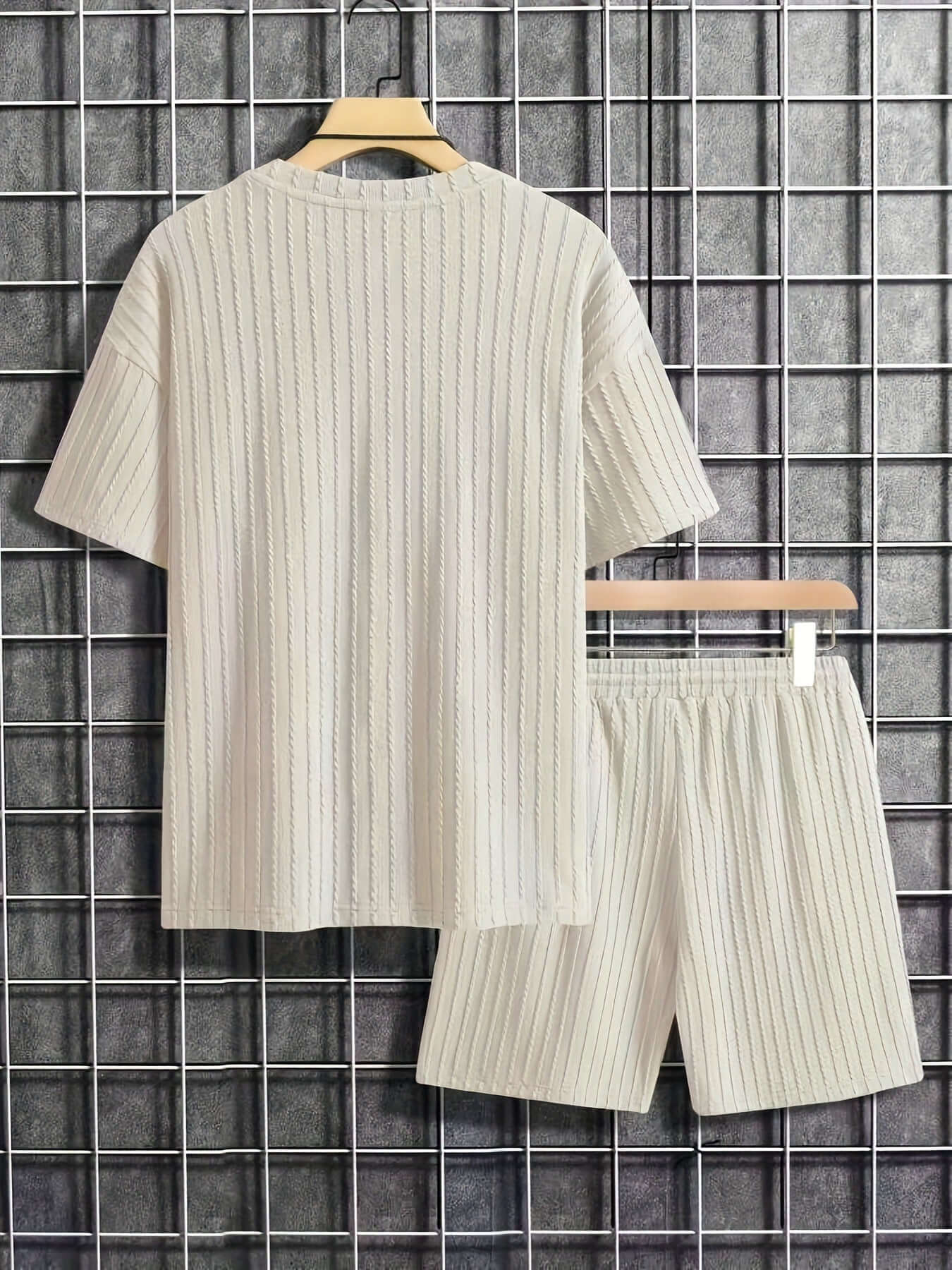 Men's milky white short sleeve knit casual suit featuring shorts, ideal for warm weather and casual outings.