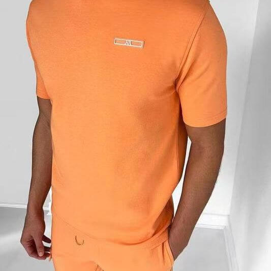 Men's orange casual sports t-shirt, ideal for athletic wear, showcasing a slim fit and stylish design.