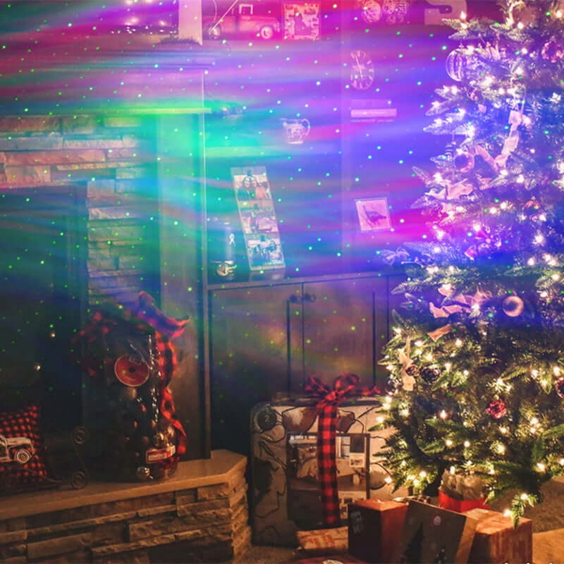 Colorful Aurora Borealis starlight projector illuminating a cozy living room with Christmas tree and gifts.
