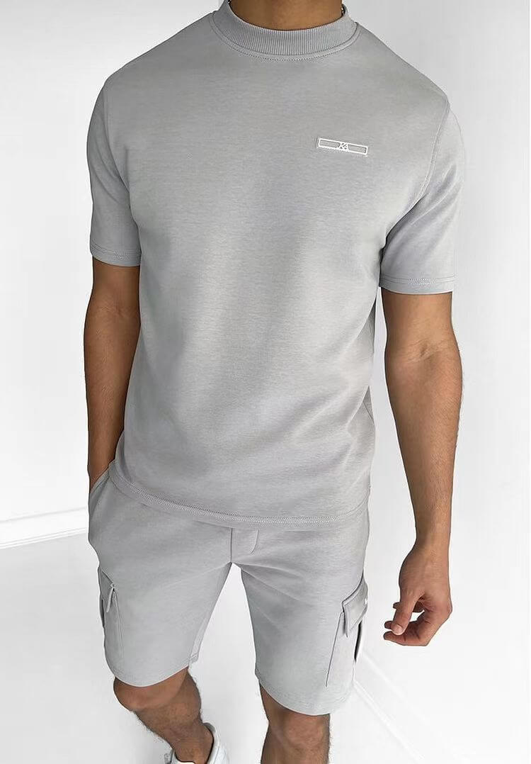 Men's casual sports multi-pocket suit in light gray with short sleeves and cargo shorts.