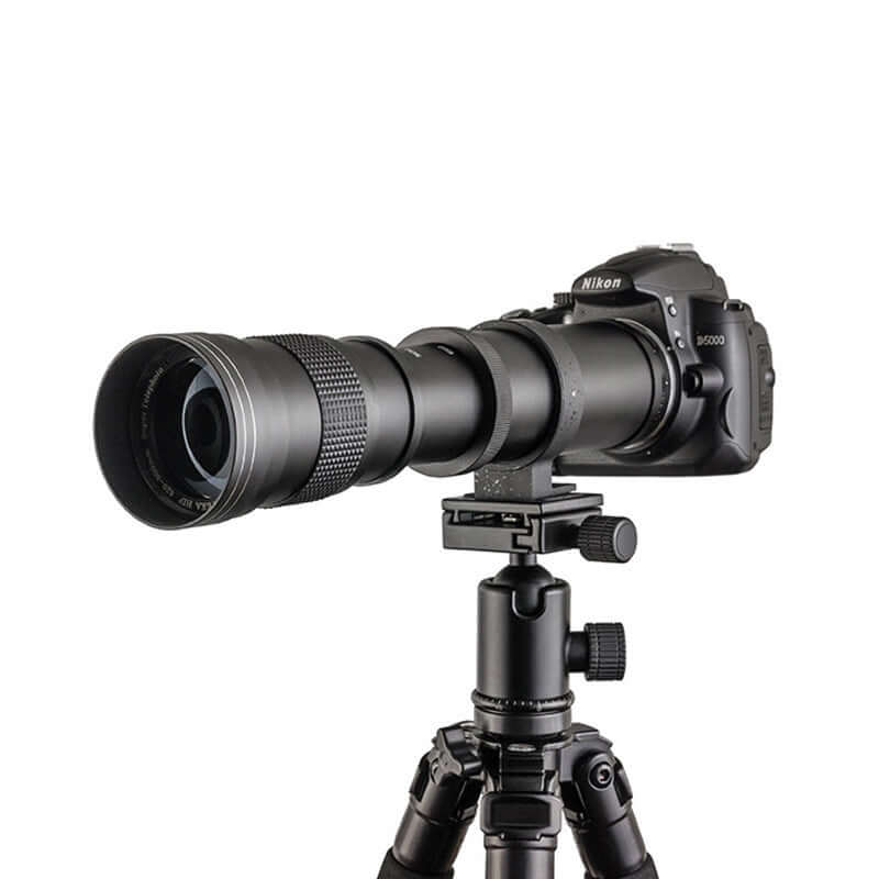 Nikon camera mounted on a tripod with a 420-800mm zoom adapter lens, ideal for wildlife and sports photography.