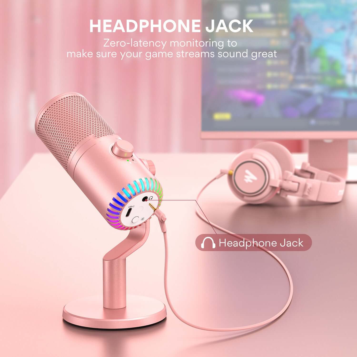 Pink USB condenser microphone with headphone jack for zero-latency monitoring, ideal for gaming and streaming.