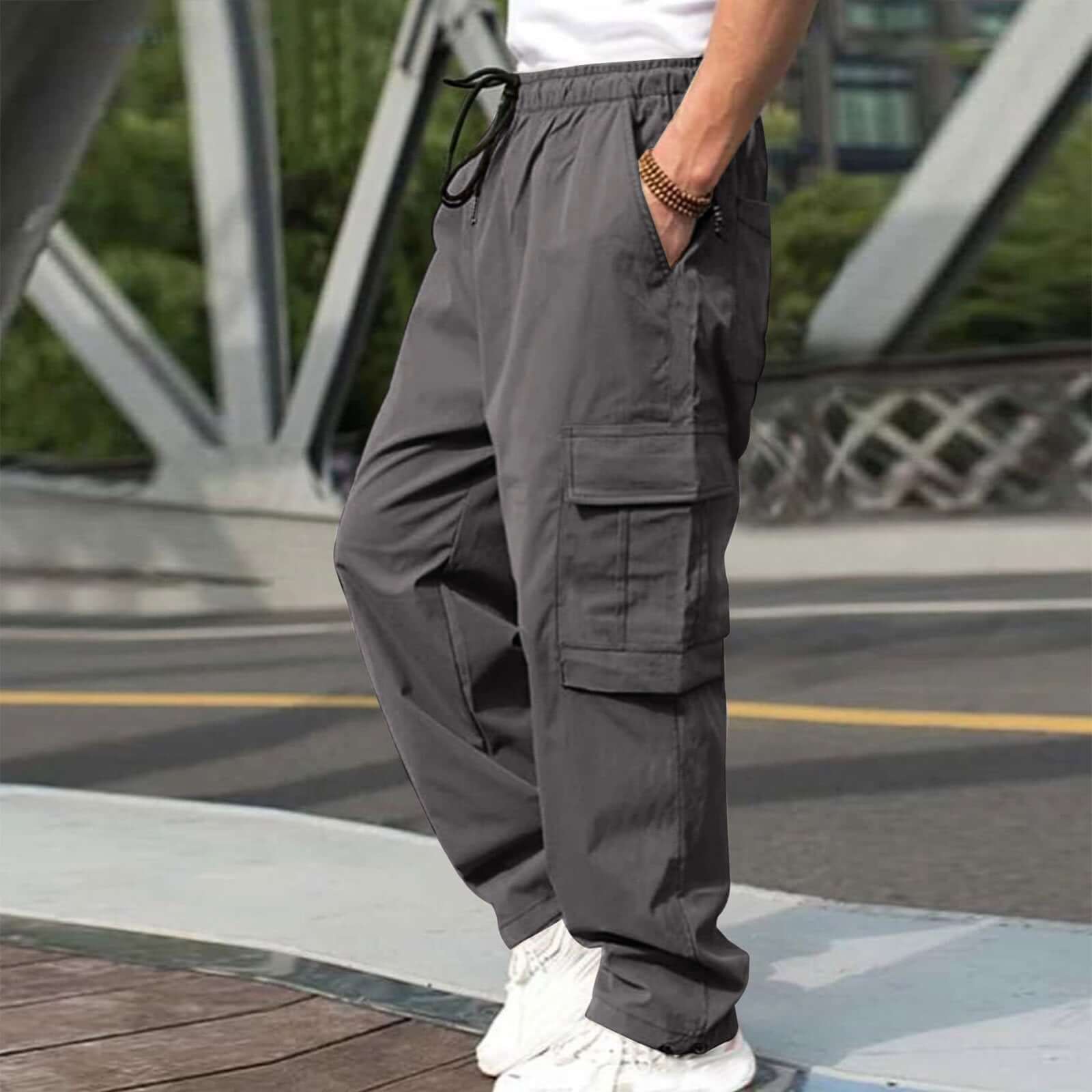 Men's loose straight cargo pants in dark gray with drawstring waist and pockets, perfect for casual wear.