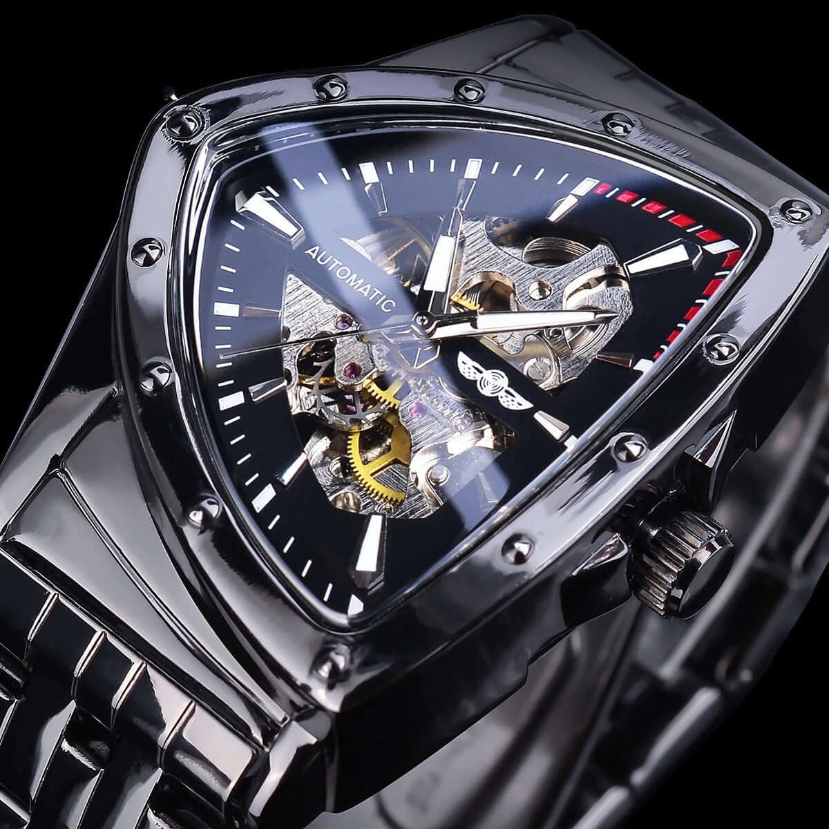 Mechanical watch with a triangular dial and transparent back, stainless steel strap, and automatic movement.