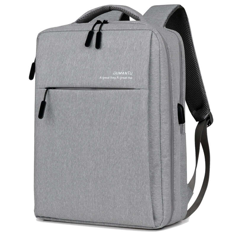 Waterproof and shockproof rechargeable laptop backpack in gray with multiple compartments and adjustable straps.