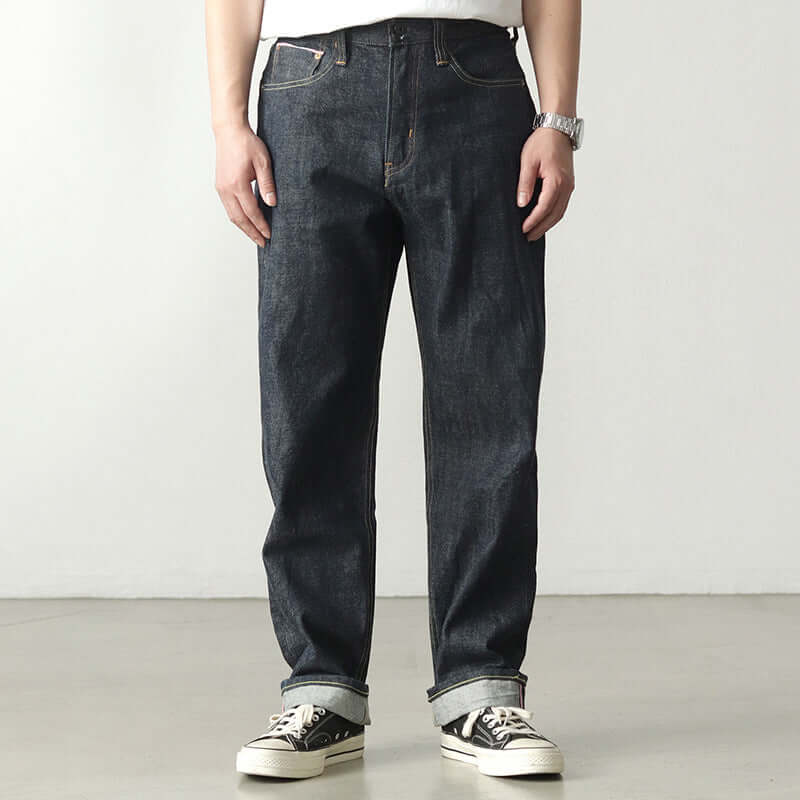 Men's dark indigo casual thickened long pants in denim, high waist with rolled cuffs.