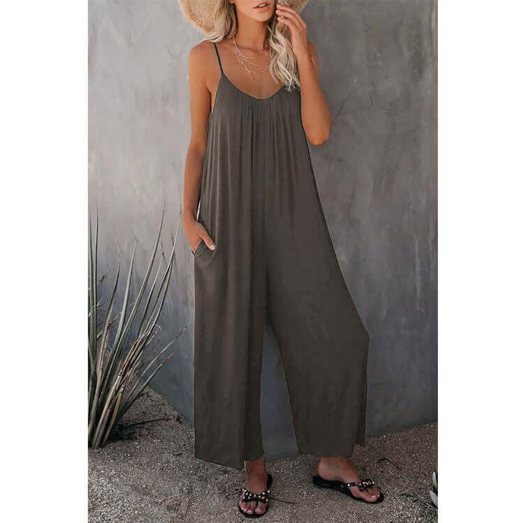 Women's loose sleeveless khaki jumpsuit romper with pockets, perfect for summer casual style.